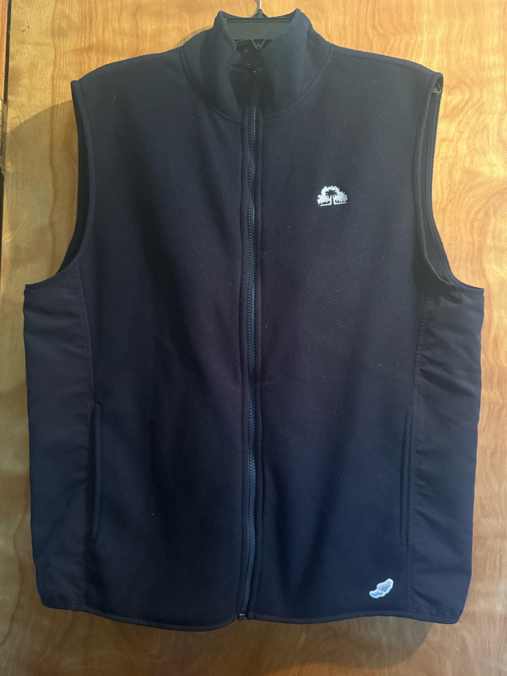 League Men's size Large Navy Fleece Vest side panel accent with Logos